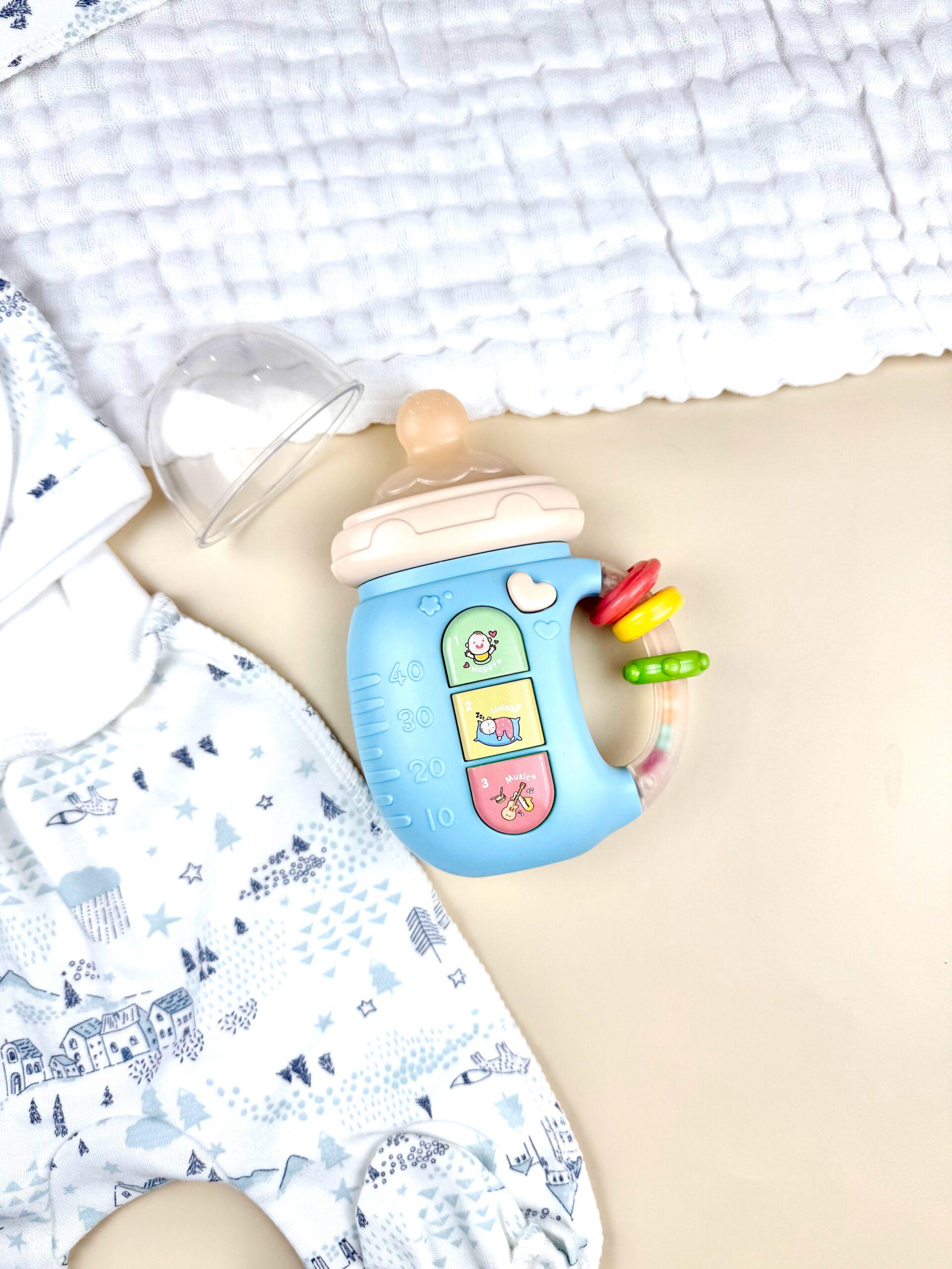 Игрушка развивающая музыкальная бутылочка-телефон 5в1 Голубой (10187) - фото 12 Игрушка развивающая музыкальная бутылочка-телефон 5в1 Голубой (10187) - фото 12