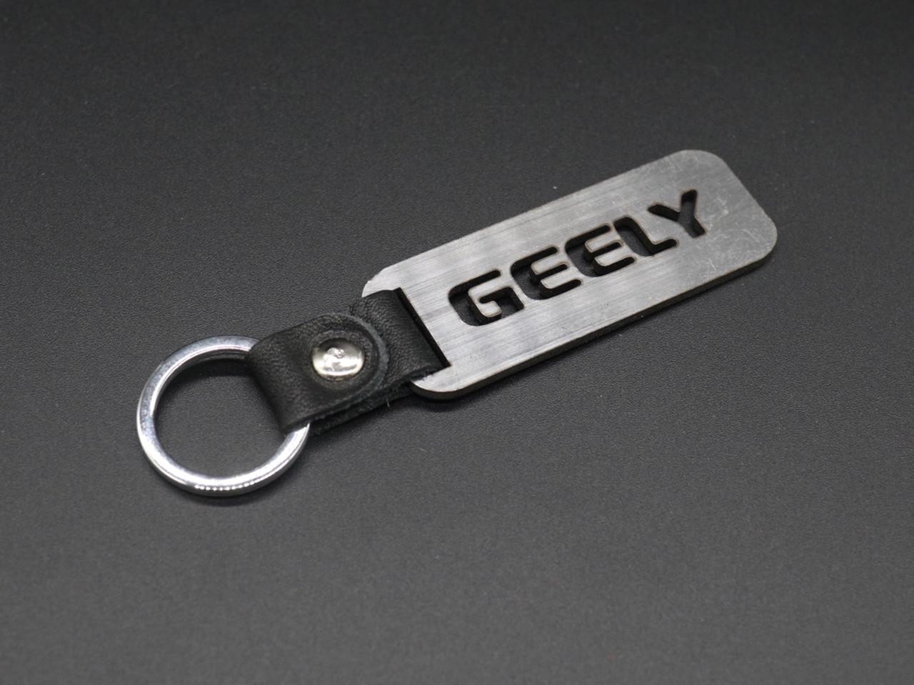 Брелок автомобильный для ключей Geely 10х2,5 см Серебристый (1116618170) Брелок автомобильный для ключей Geely 10х2,5 см Серебристый (1116618170)