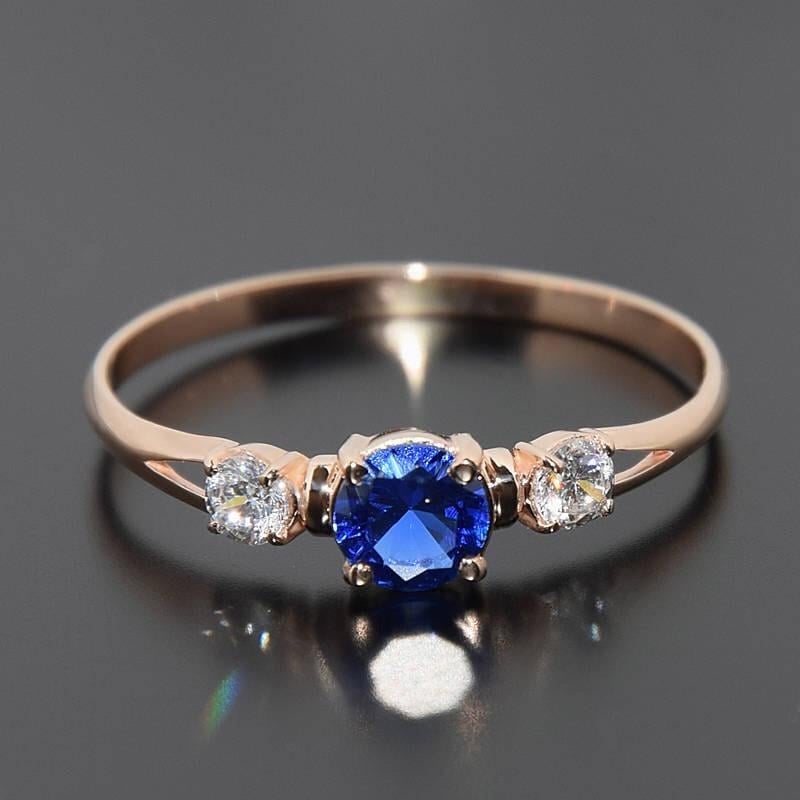Кільце з червоного золота з синім фіанітом (2249397168)