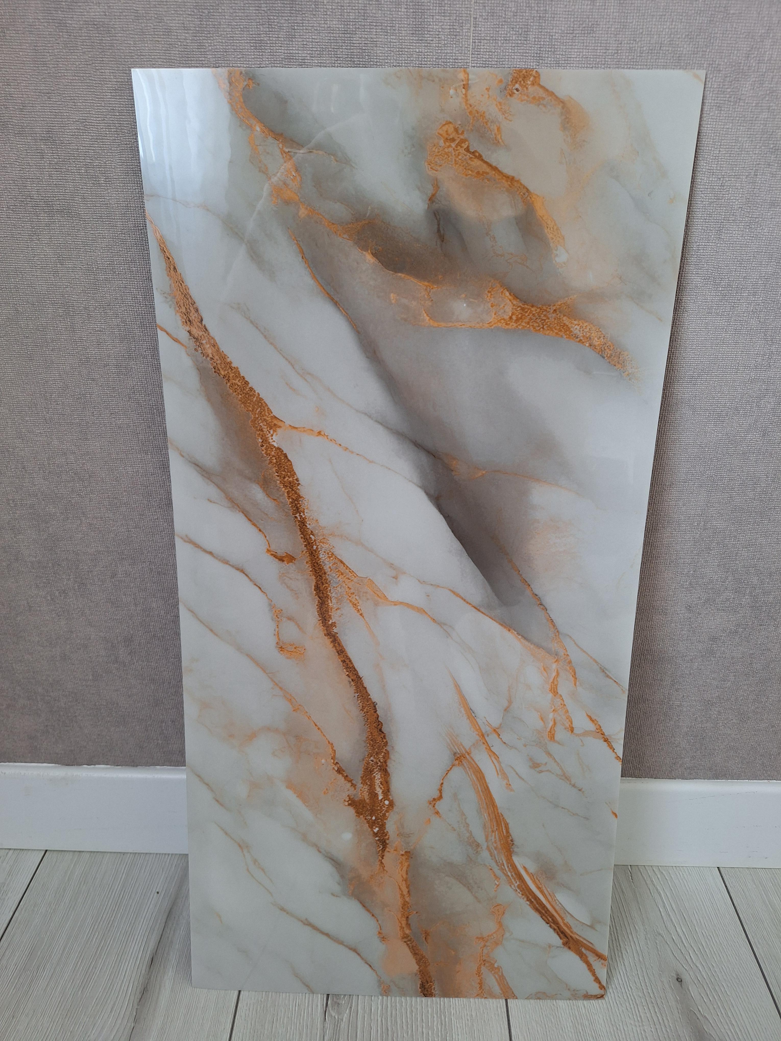 Плитка-самоклейка вінілова мармур 600х300х2 мм глянцевий (F033) Плитка-самоклейка вінілова мармур 600х300х2 мм глянцевий (F033)