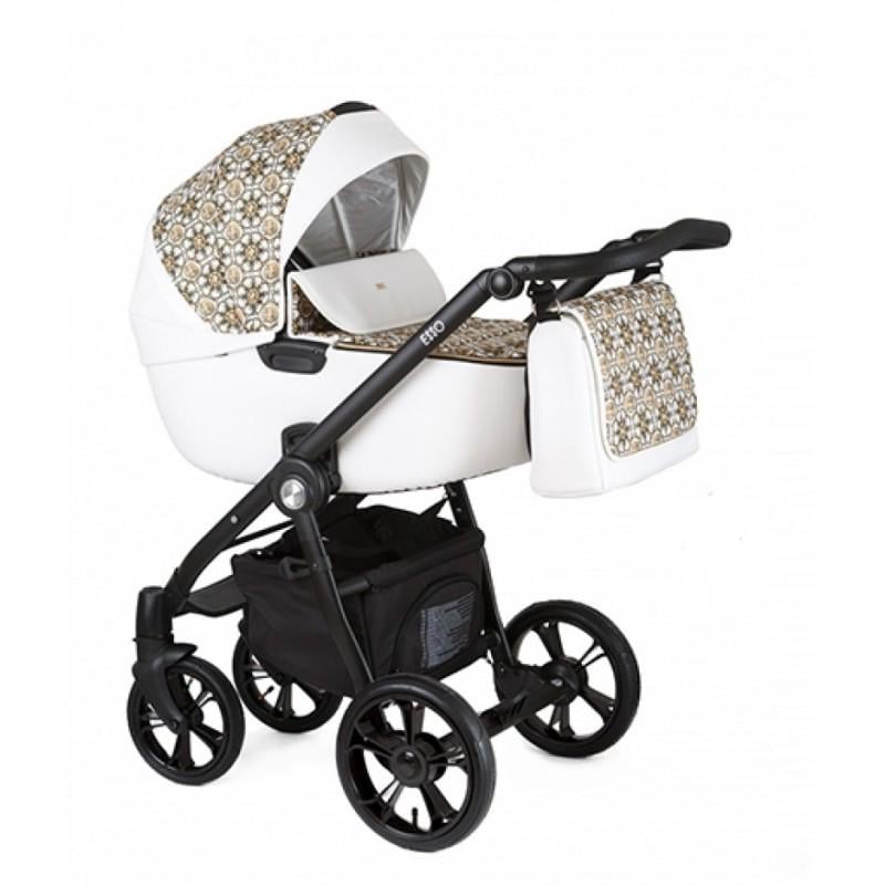 Коляска Roan Esso универсальная 2в1 с матрасом дождевиком и сумкой Gold/White ornaments