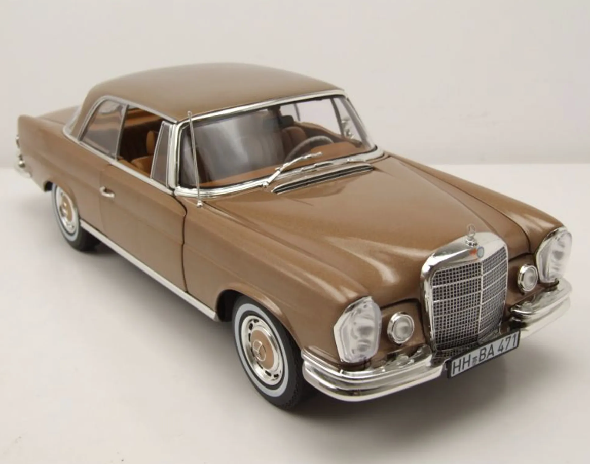 Модель автомобиля Norev 1:18 Mercedes-Benz 250 Coupe SE Gold Metallic (183759)