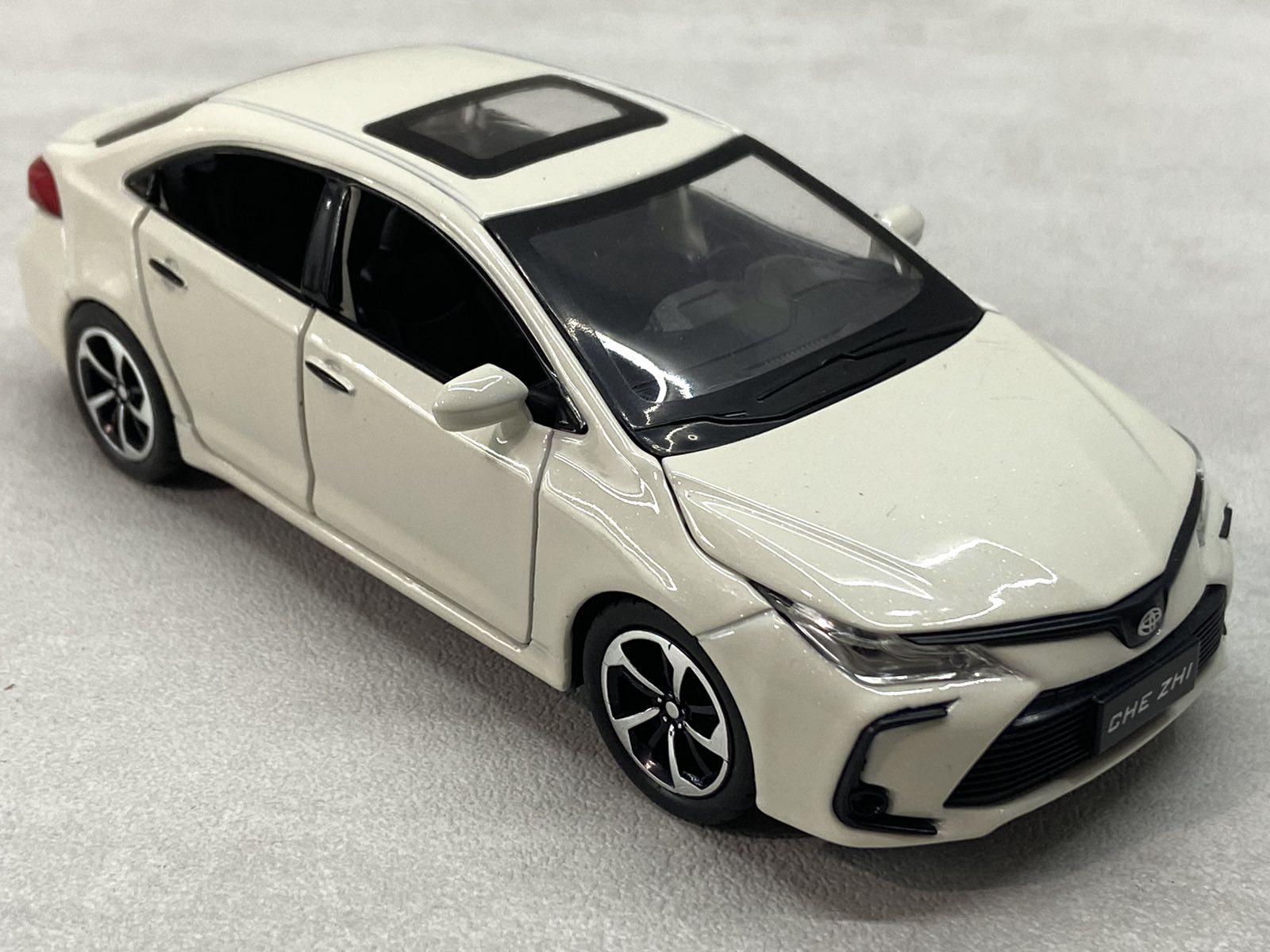 Машинка TK Union Group Toyota Corolla інерційна 1:32 Білий (GT-6258)