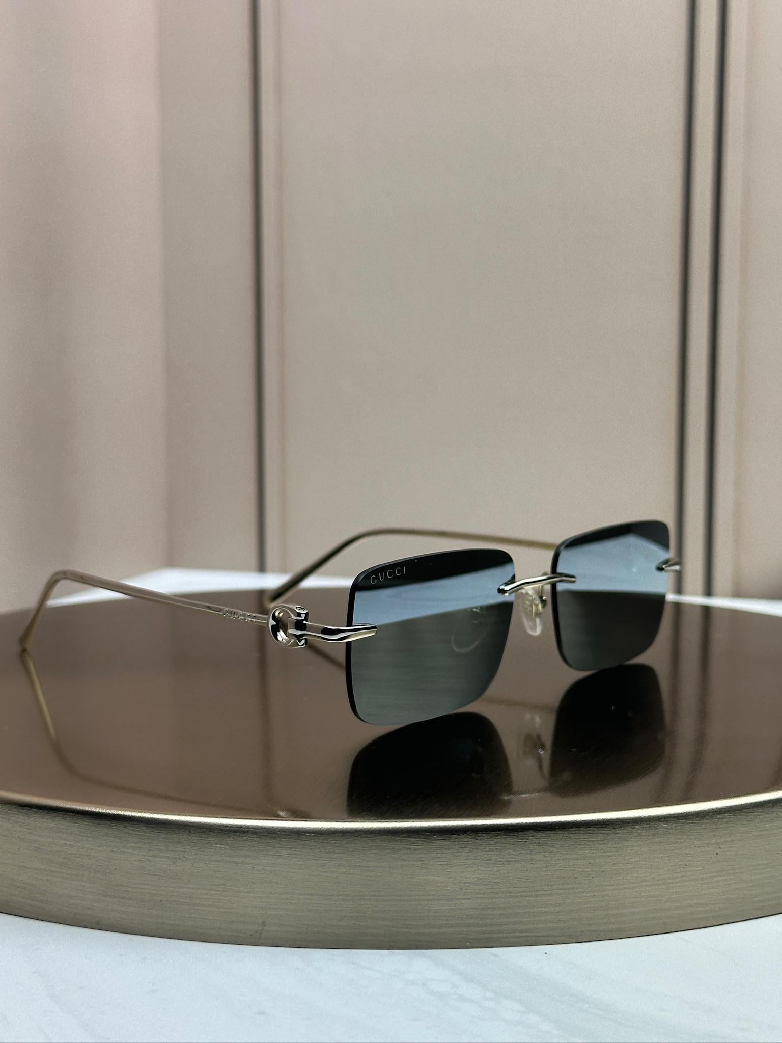 Солнцезащитные очкиGucci GG1703S безободочные прямоугольные серо-голубая линза Серебряный