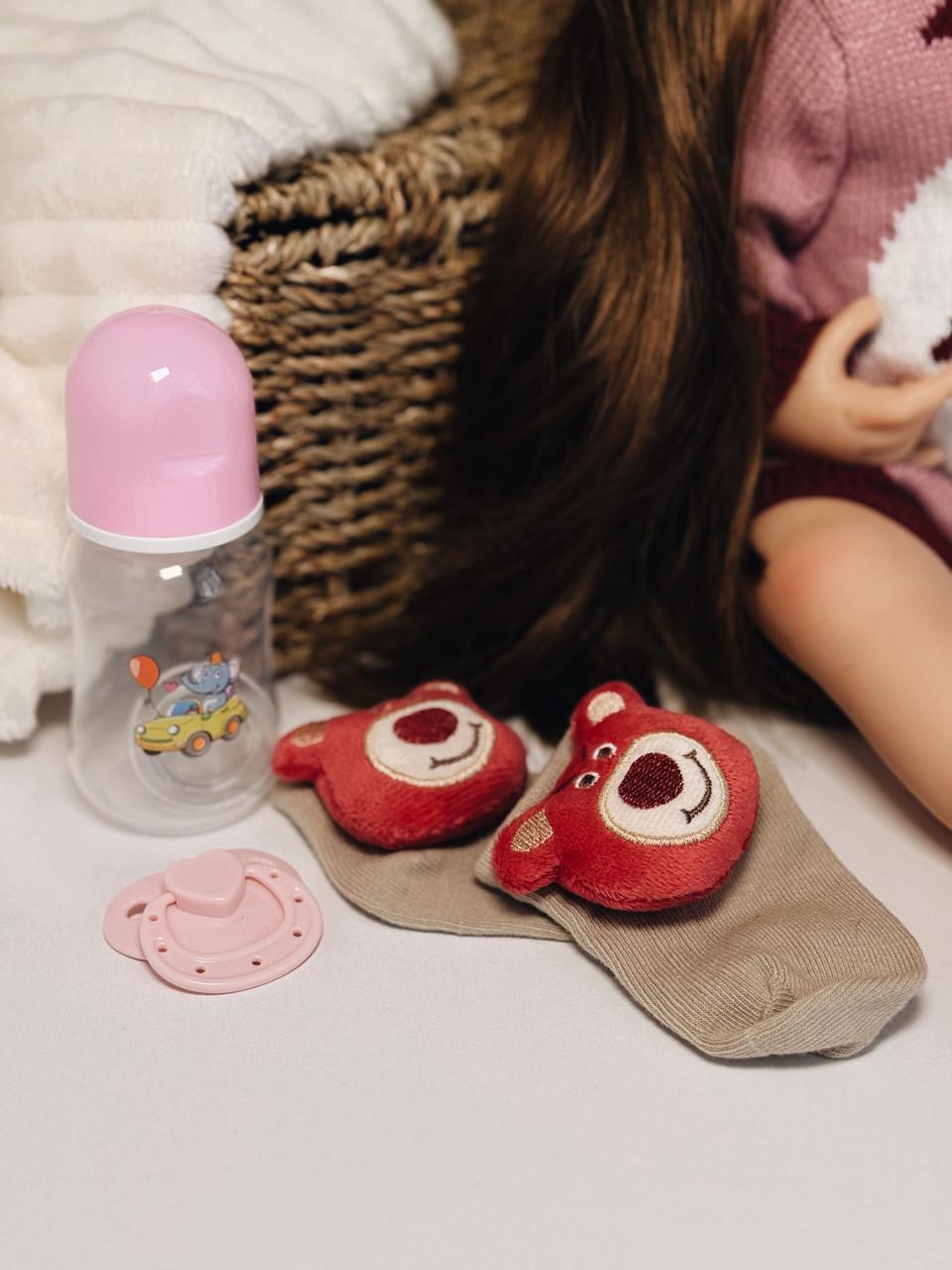 Кукла кукла реалистичная KEIUMI винил-силиконовая в вязаной кофточке с мишкой и аксессуарами 55 см - фото 5