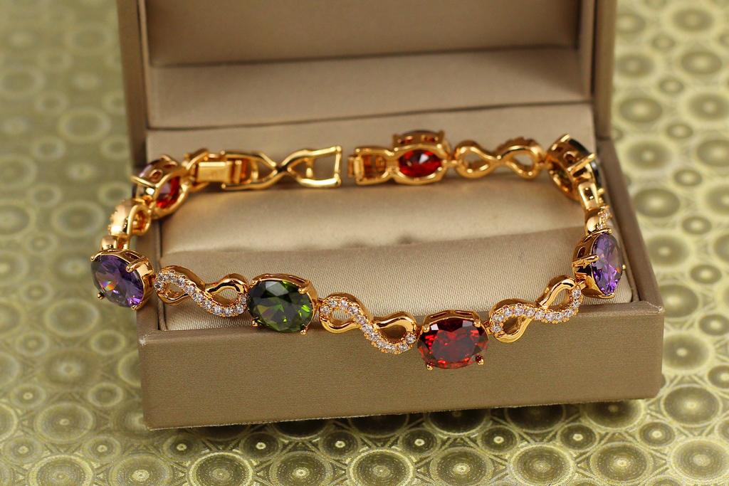 Браслет Xuping Jewelry Витражи времени с темными разноцветными камнями 17 см 8 мм Золотистый (34112002)