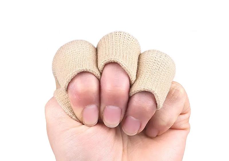 Бандаж защитный Toelab спортивный, эластичный для суставов пальцев рук 10 шт. Бежевый (M183) - фото 2 Бандаж защитный Toelab спортивный, эластичный для суставов пальцев рук 10 шт. Бежевый (M183) - фото 2