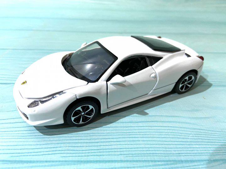 Машинка TK Union Group Ferrari LF-27029 1:32 металлическая Белый (40668049)