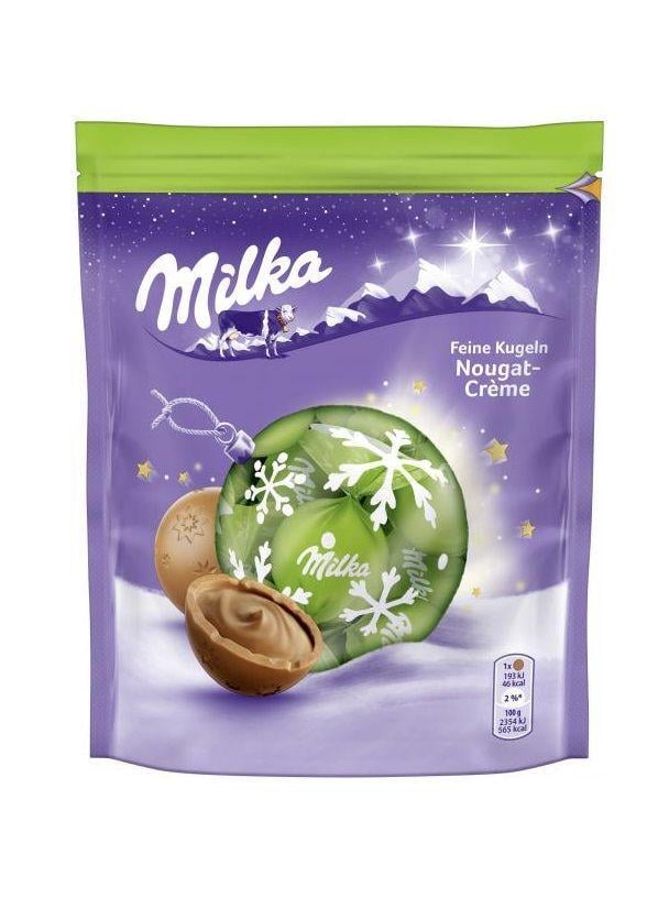 Шоколадні цукерки Milka Feine Kugeln Nougat Creme з нугою 90 г