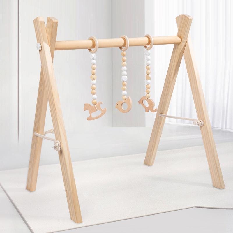 Іграшка для малюків Baby Gym Lummi Montessori дерев'яний тренажер з підвісними іграшками (23153)