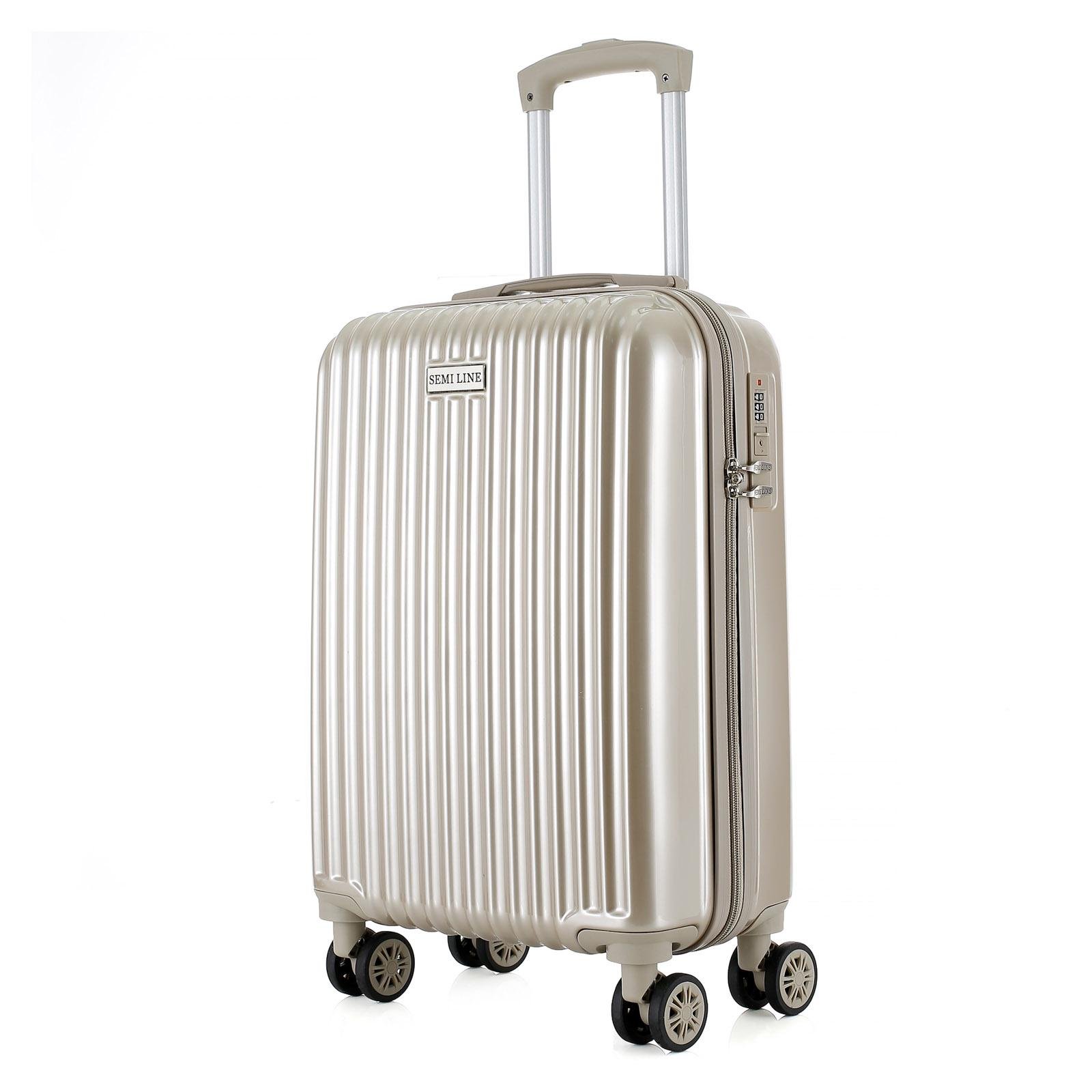 Валіза SEMI LINE 20" T5954-1 40 л полікарбонат/ABS 4 спарені колеса алюмінієва ручка заглиблений кодовий замок ручна поклажа S Gold