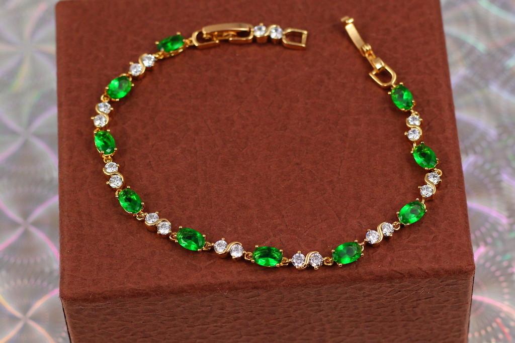 Браслет Xuping Jewelry Волна с зелеными камнями 19 см 4 мм Золотистый (1765284992)