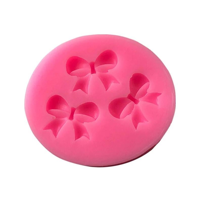 Молд силиконовый Бантики 58x50 мм Розовый (2032) Молд силиконовый Бантики 58x50 мм Розовый (2032)