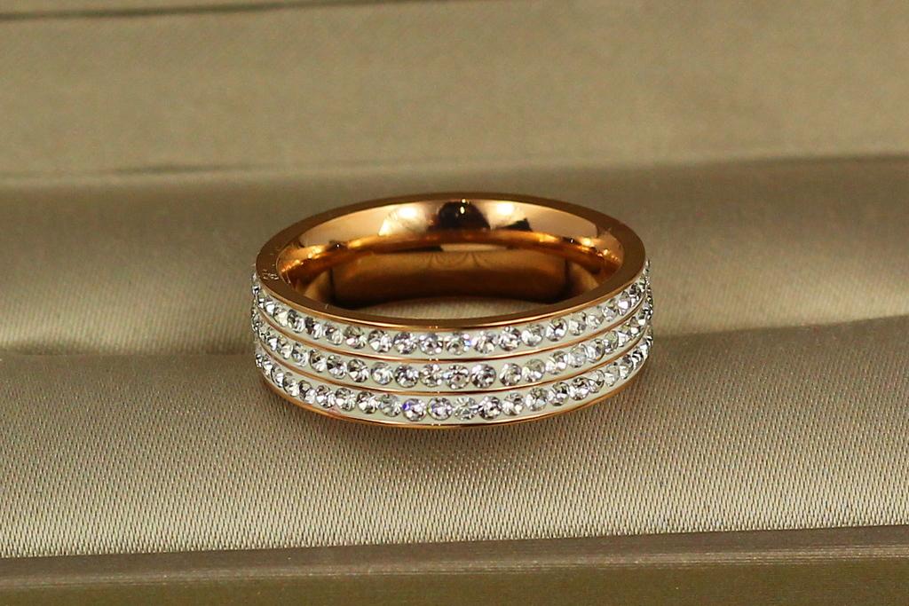 Кольцо Xuping Jewelry Дорожки с камнями по кругу р. 18 Золотистый