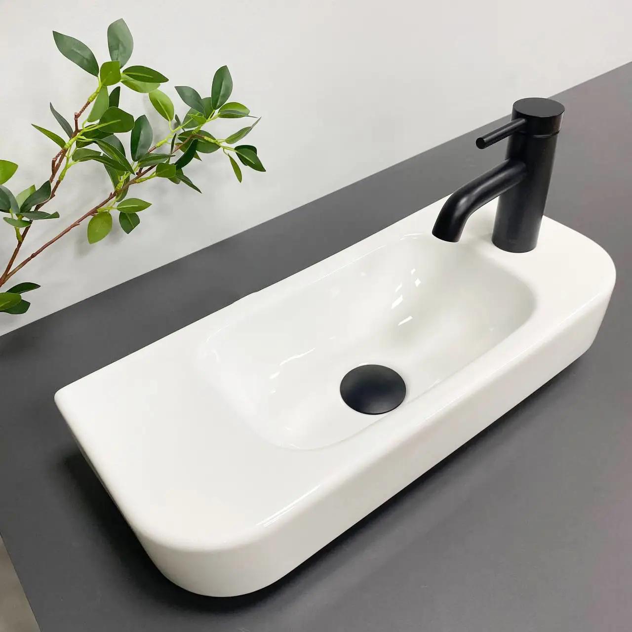 Раковина підвісна VBI Aprilia L прямокутна 220x505 мм Білий (RM-VBI-015608) - фото 3 Раковина підвісна VBI Aprilia L прямокутна 220x505 мм Білий (RM-VBI-015608) - фото 3