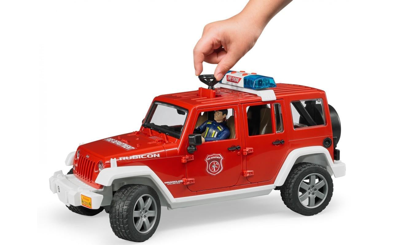 Игрушка Bruder пожарный джип Wrangler Unlimited Rubicon с пожарным (02528)