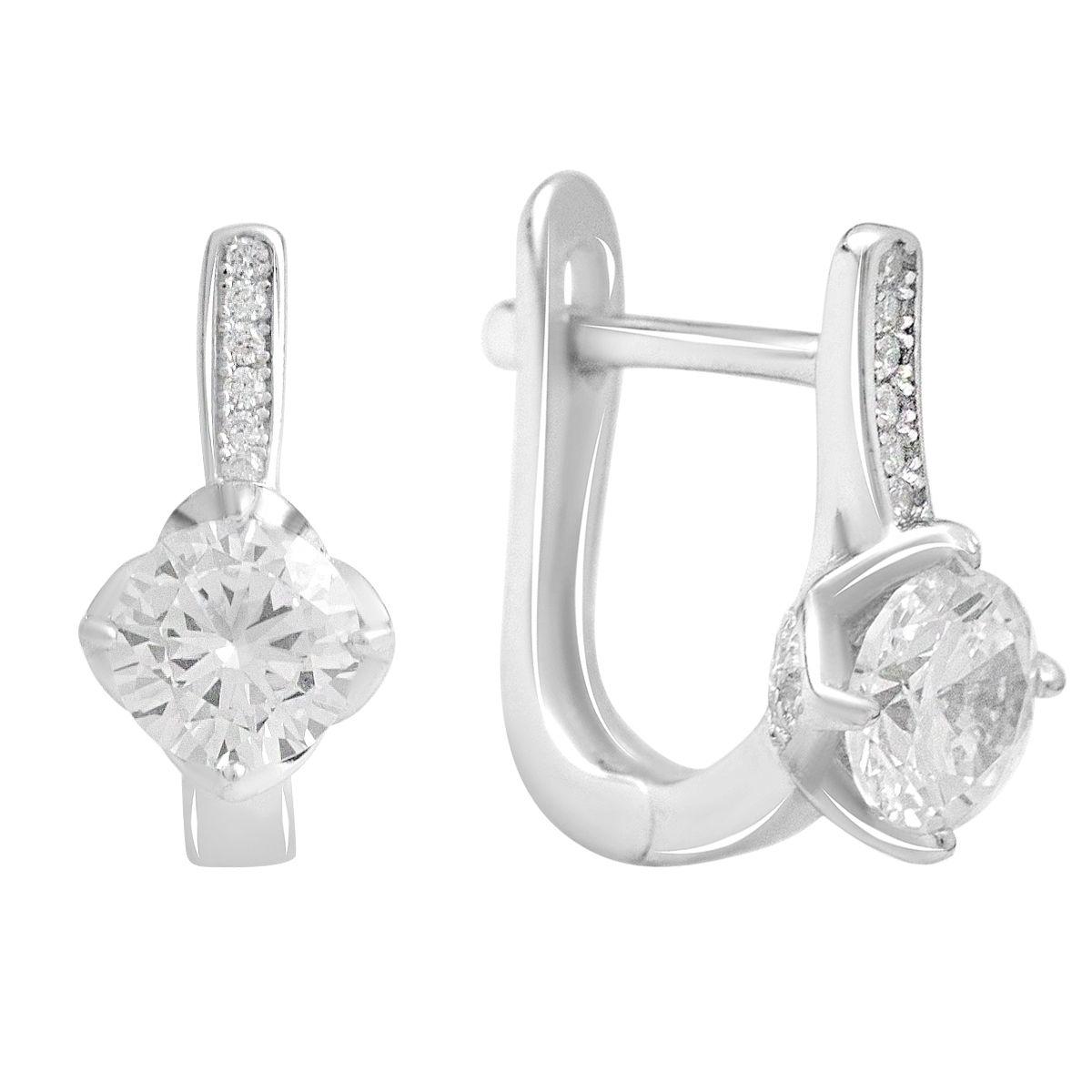 Серьги серебряные с большим фианитом и дорожкой камней Серьги серебряные с большим фианитом и дорожкой камней