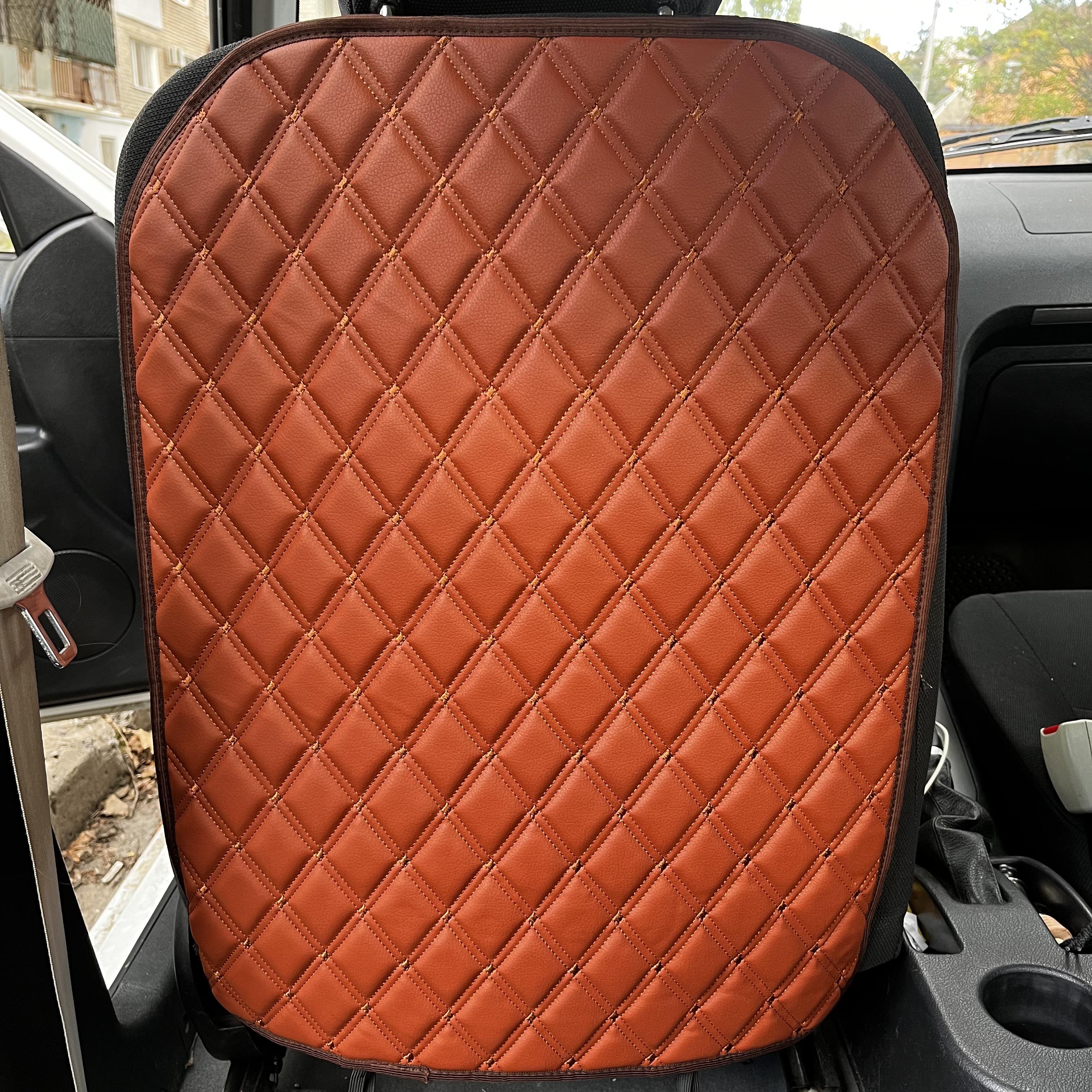 Накидка захисна на спинку переднього сидіння автомобіля з екошкіри 60x45 см без кармана Коричневий (29882956) - фото 1 Накидка захисна на спинку переднього сидіння автомобіля з екошкіри 60x45 см без кармана Коричневий (29882956) - фото 1