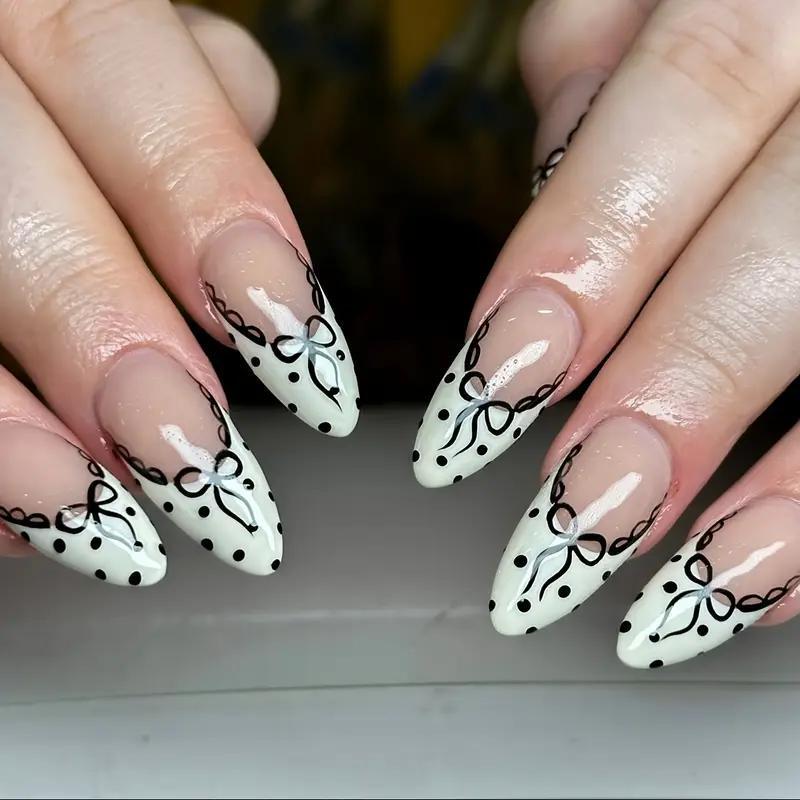 Накладные ногти френч с дизайном бант в горошек миндаль с клеевыми пластинами 24 шт. Белый с черным (2789190687) - фото 2 Накладные ногти френч с дизайном бант в горошек миндаль с клеевыми пластинами 24 шт. Белый с черным (2789190687) - фото 2