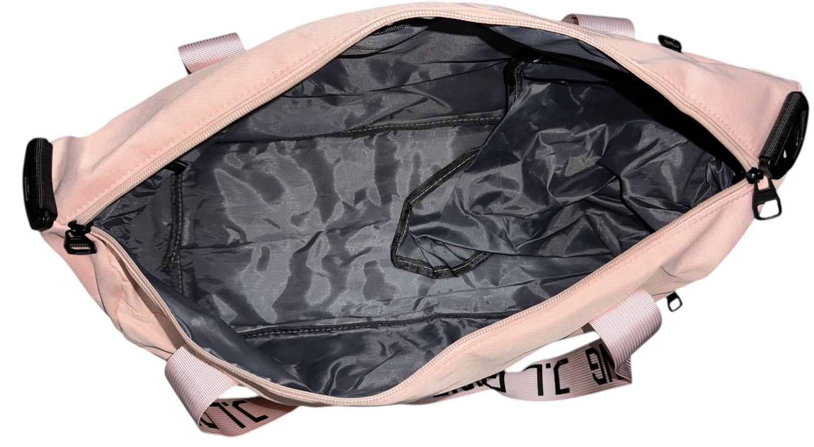 Сумка дорожня 50 л з боковими кишенями та з довгим ремінем через плече Рожевий (4200) - фото 6 Сумка дорожня 50 л з боковими кишенями та з довгим ремінем через плече Рожевий (4200) - фото 6