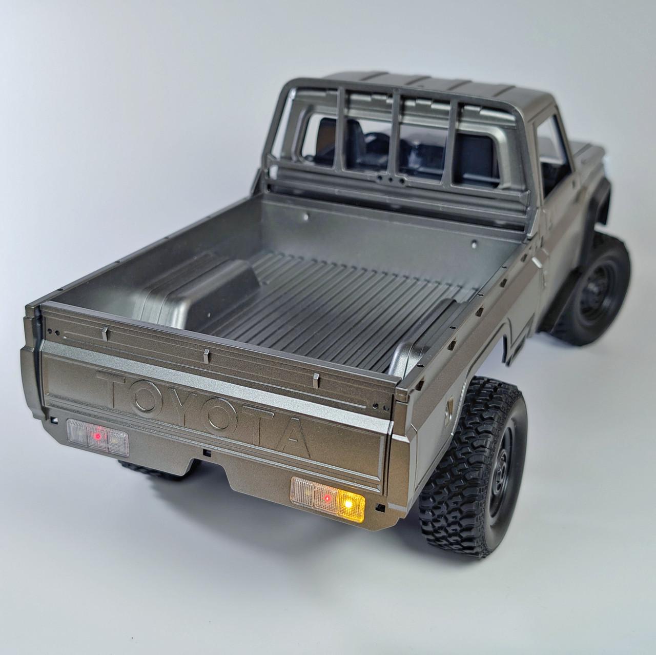 Машинка на радіокеруванні MN82 Pro Toyota Land Cruiser 79 - фото 4 Машинка на радіокеруванні MN82 Pro Toyota Land Cruiser 79 - фото 4