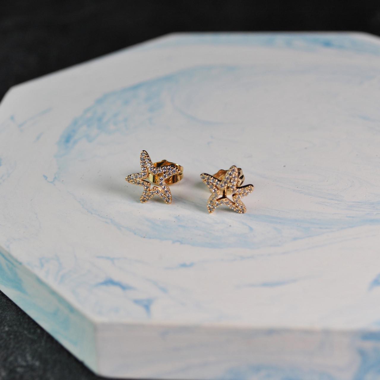 Сережки-цвяшки морські зірки медична сталь позолота (x091-2) Сережки-цвяшки морські зірки медична сталь позолота (x091-2)