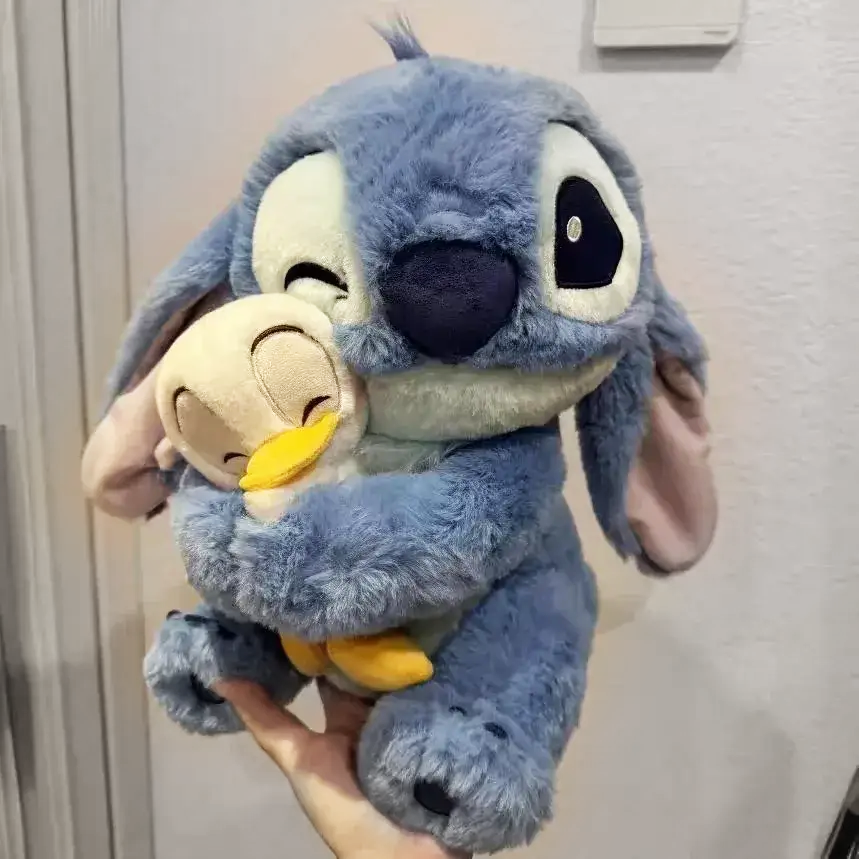 Іграшка Стіч Disney з каченям 350 г 30 см (MK001039) - фото 5 Іграшка Стіч Disney з каченям 350 г 30 см (MK001039) - фото 5