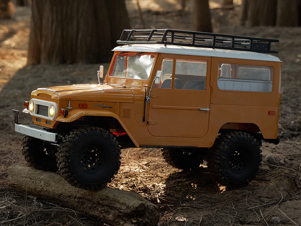 Машинка на радиоуправлении FMS 1:10 Toyota Land Cruiser FJ40 RS Yellow - фото 4 Машинка на радиоуправлении FMS 1:10 Toyota Land Cruiser FJ40 RS Yellow - фото 4