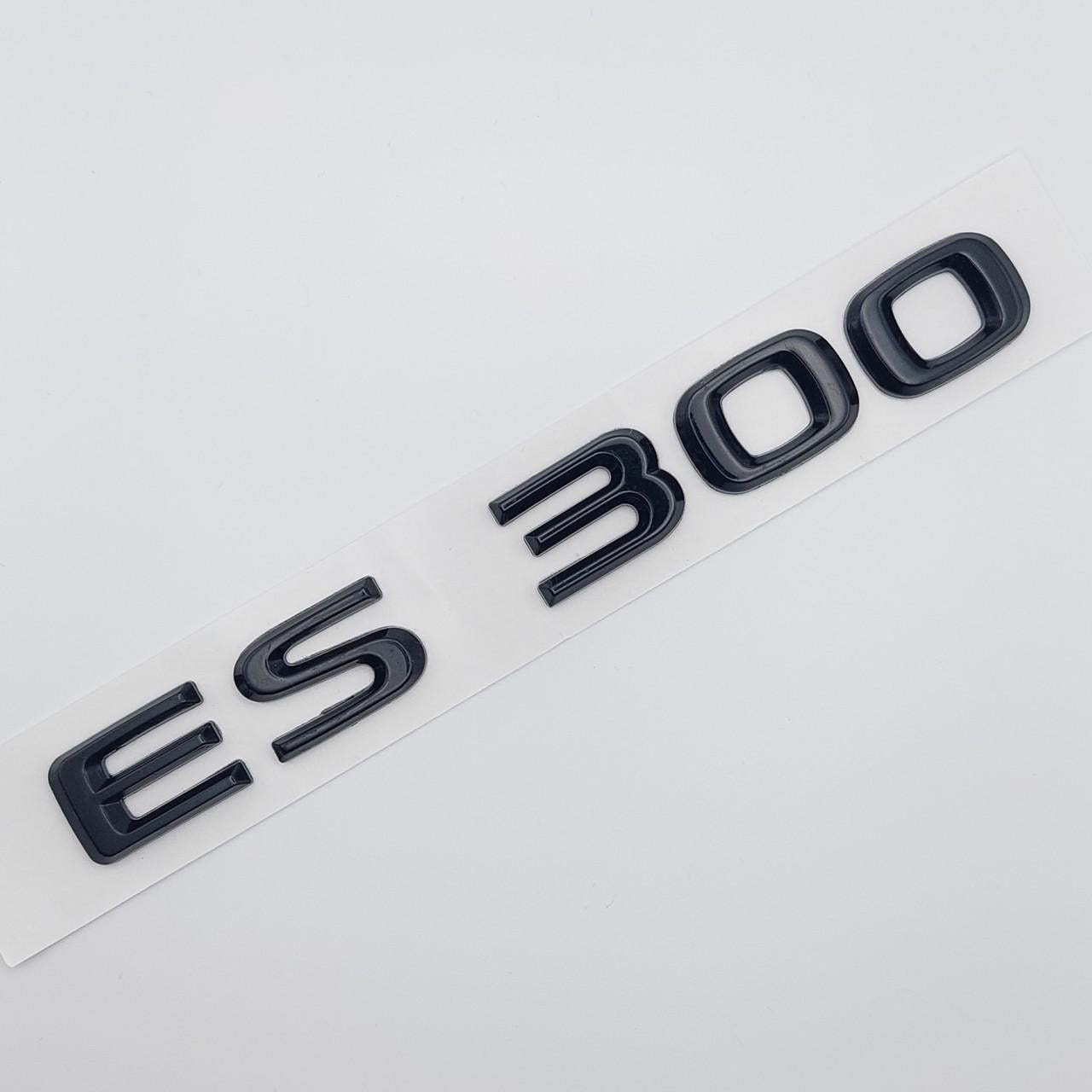 Эмблема надпись ES300 Lexus металл 17,5х2 см Черный глянцевый (1736823296)