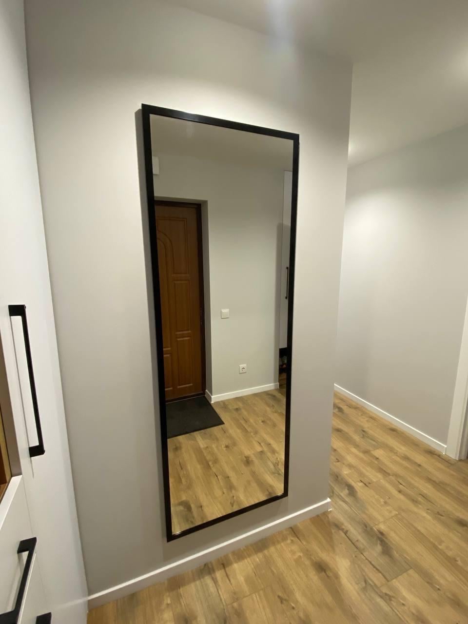 Зеркало настенное СклоГарт в черной раме 130х50 см (29200119)