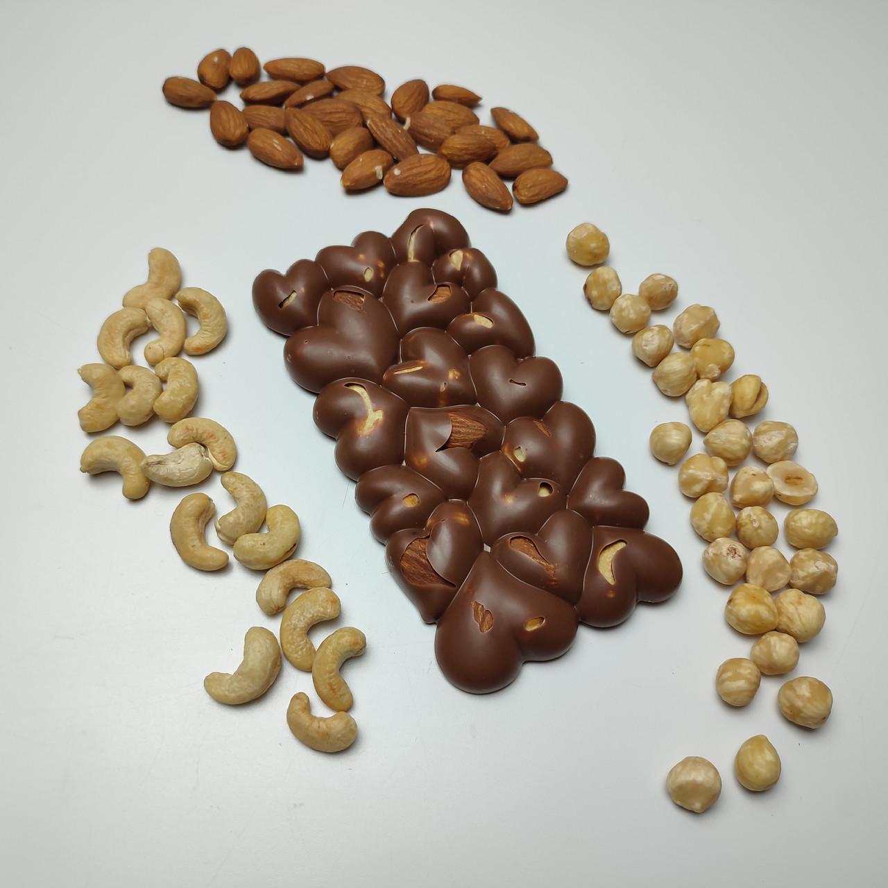 Шоколад молочный 33,6% с целыми орехами ассорти 90 г (2429096071) - фото 3 Шоколад молочный 33,6% с целыми орехами ассорти 90 г (2429096071) - фото 3