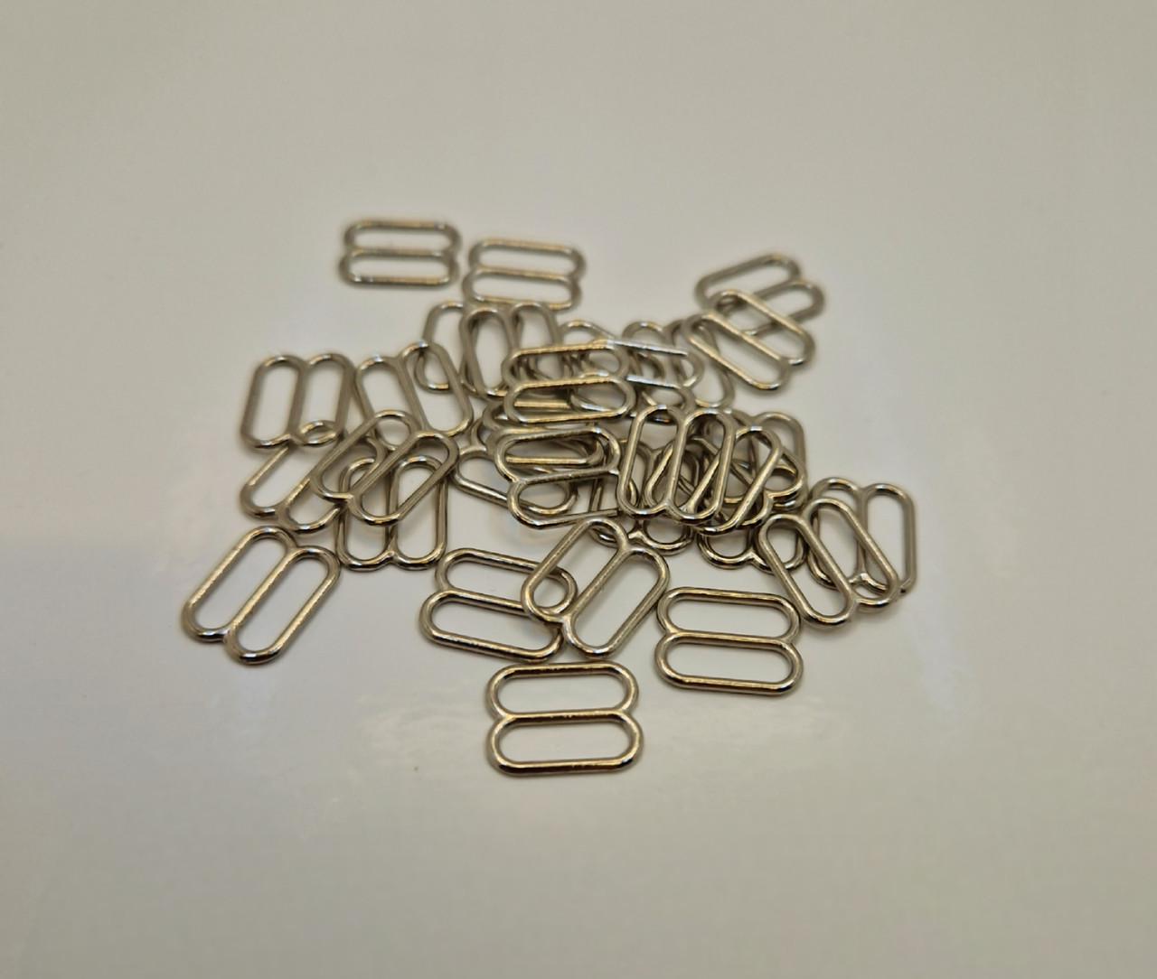 Регулятор вісімка для бретелів бюстгальтера металевий 1 см Нікель (2252027443) - фото 2 Регулятор вісімка для бретелів бюстгальтера металевий 1 см Нікель (2252027443) - фото 2