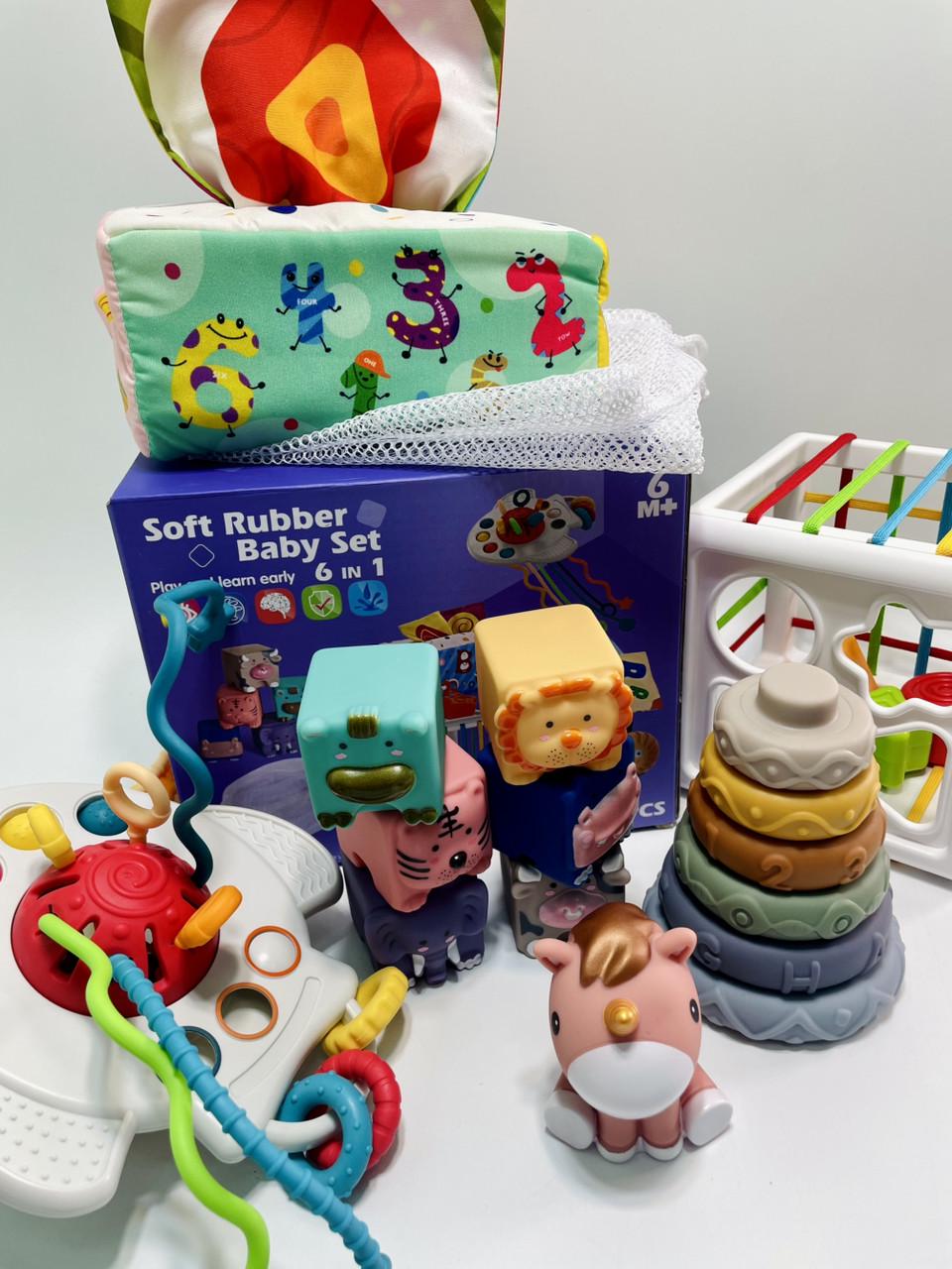 Набір для розвитку кубики/брязкальця/прорізувачі/фігурка пірамідка/серветки/мішечок/куб 34 елементи - фото 2 Набір для розвитку кубики/брязкальця/прорізувачі/фігурка пірамідка/серветки/мішечок/куб 34 елементи - фото 2