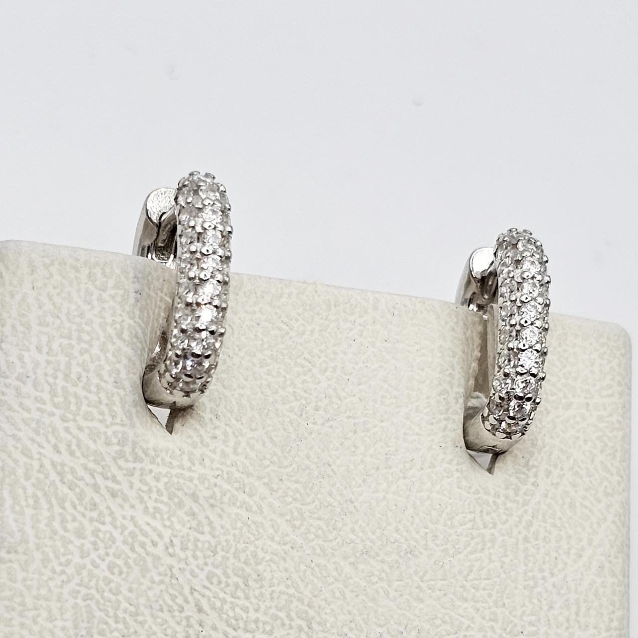 Серебряные серьги-кольца с кубическим цирконием 2,45 г (2965757037) Серебряные серьги-кольца с кубическим цирконием 2,45 г (2965757037)