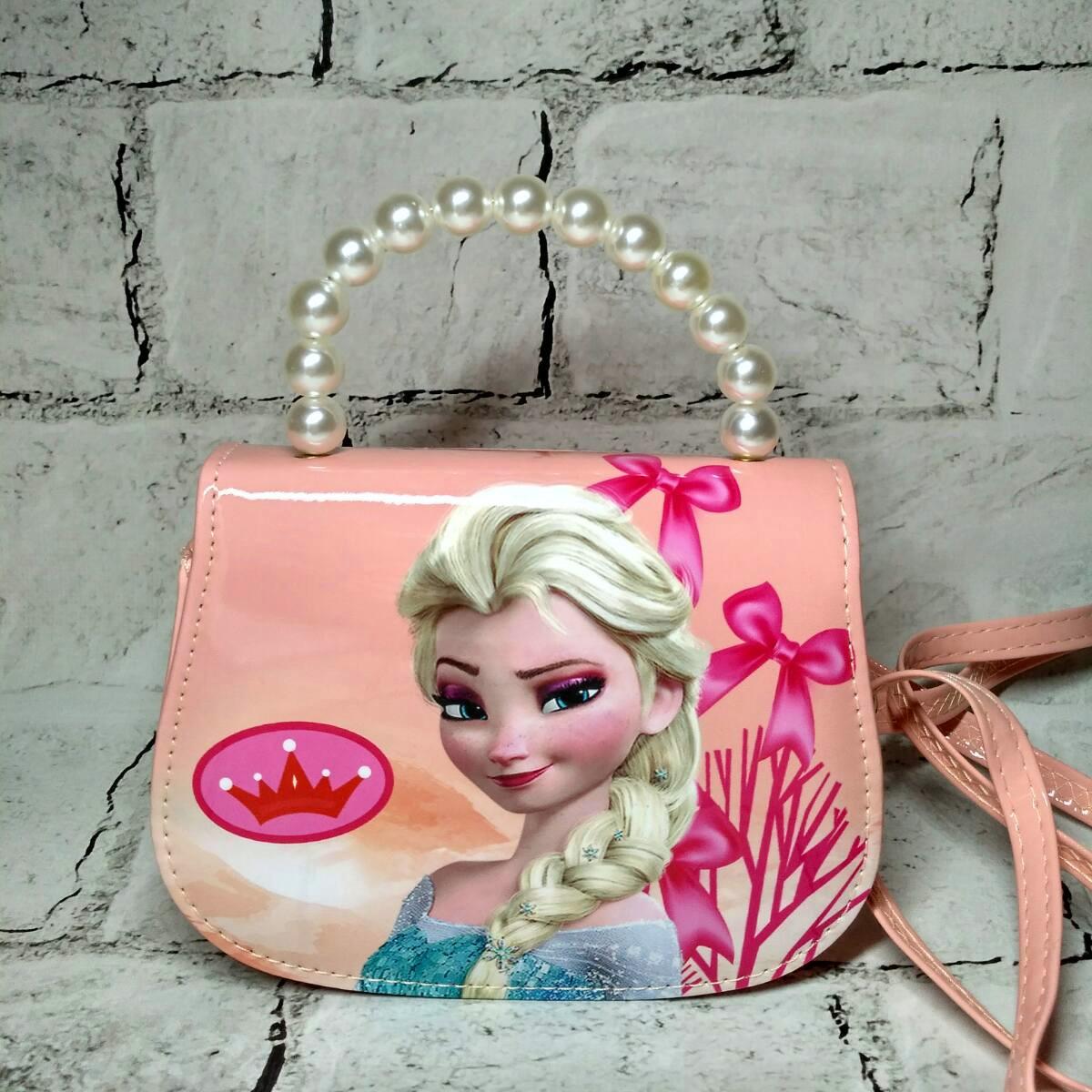 Сумочка детская для девочки лаковая с ремешком Эльза 16,5х12х7 см Персиковый (9122-4) Сумочка детская для девочки лаковая с ремешком Эльза 16,5х12х7 см Персиковый (9122-4)