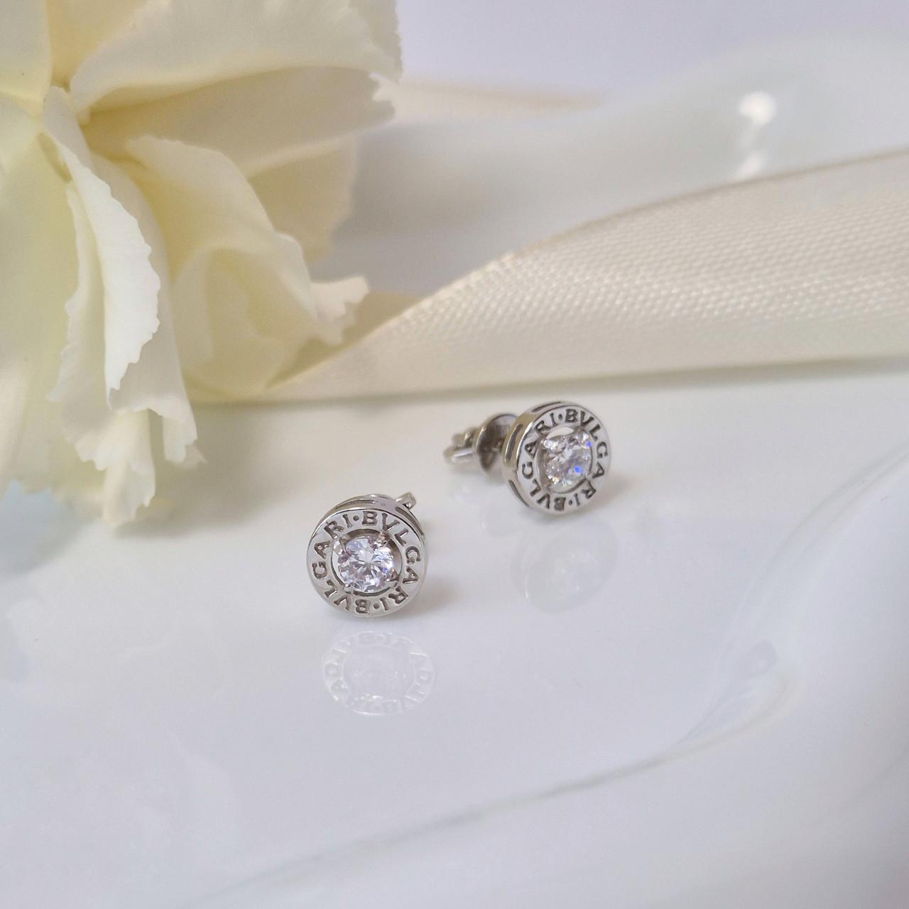 Серьги гвоздики на закрутках с белым камнем серебро 925 пробы 1,58 г (1590гв)