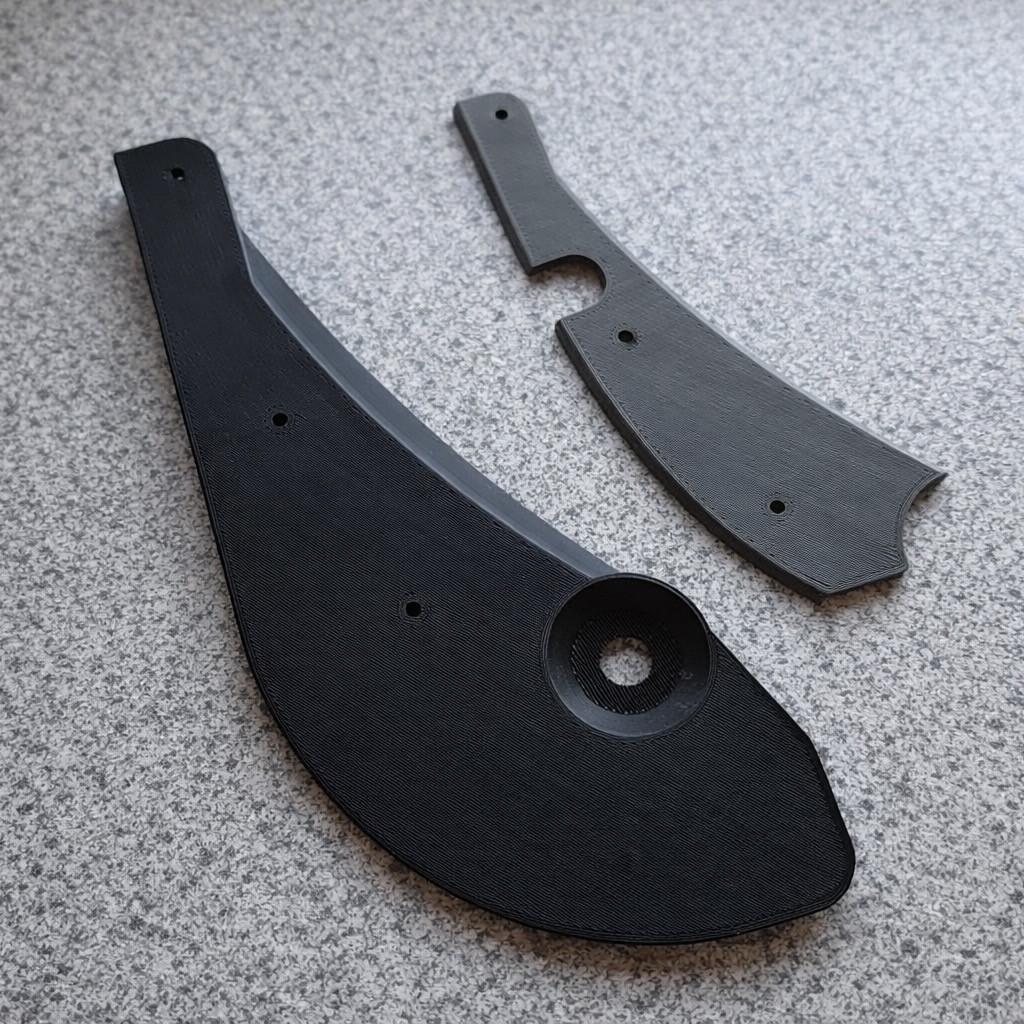 Бризковики передні Tesla Model 3 пластик