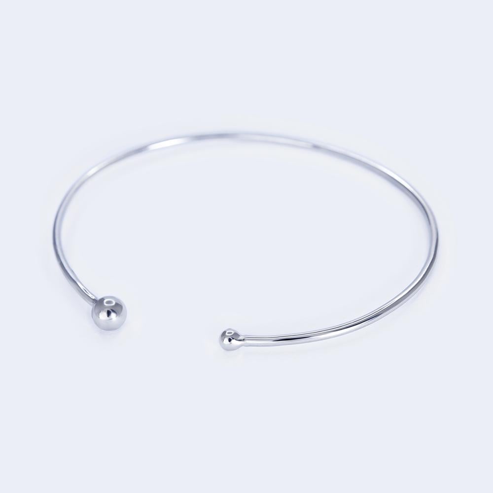 Браслет срібний жорсткий з двома намистинами р. 17 см (b2-26)