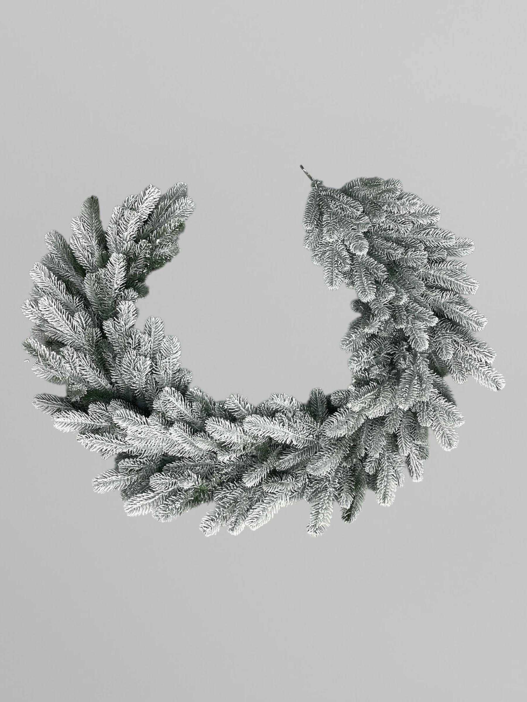 Хвойная гирлянда литая Lux заснеженная 200 см Зеленый (Н02006)