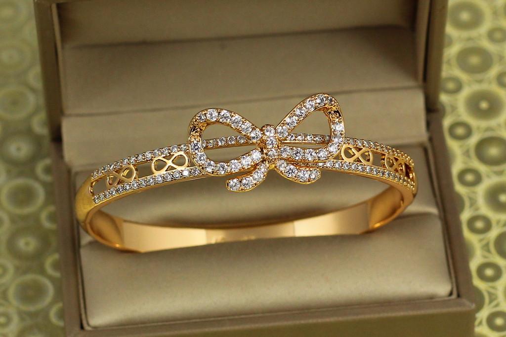 Браслет бенгл Xuping Jewelry Бант 57 мм 15 мм на руку Золотистый (2388534762)