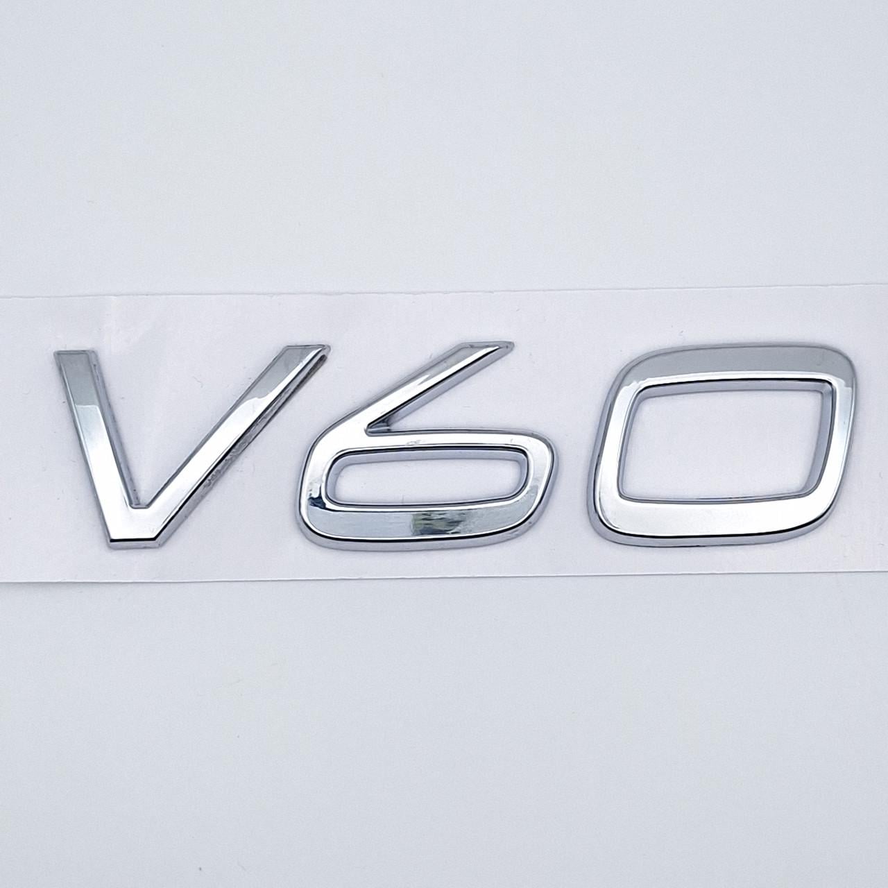 Эмблема надпись V60 Volvo ABS 10,1х2,7 см Хром глянцевый (2490995150)