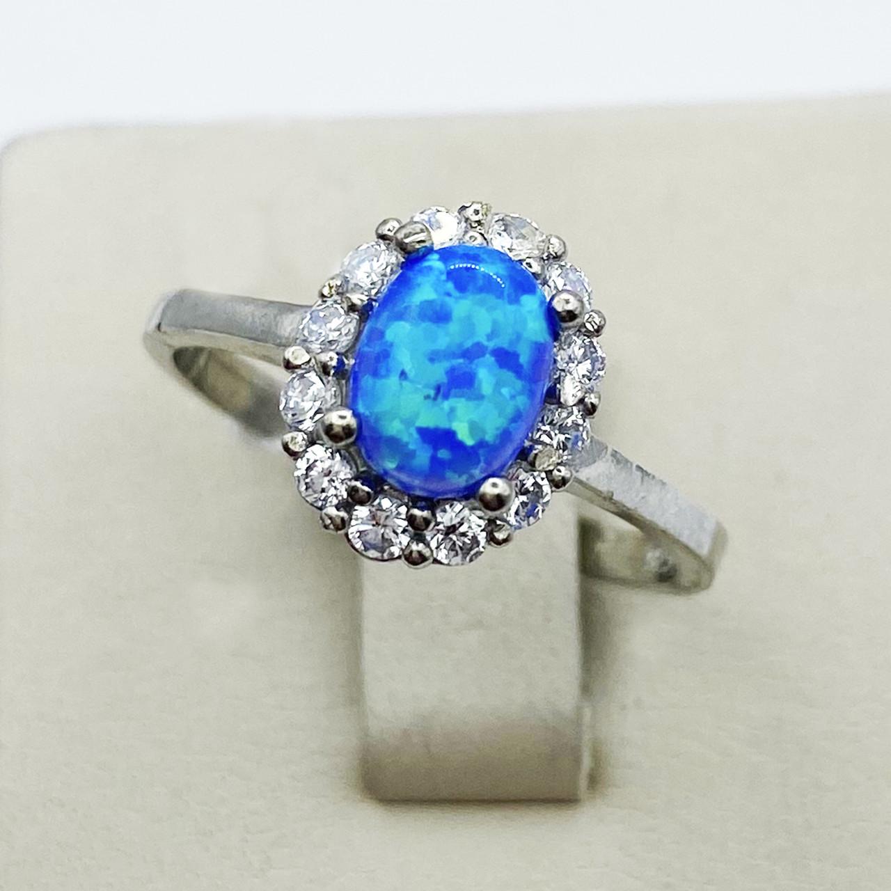 Кольцо серебряное с синим опалом р. 19 3,02 г (1913185492)