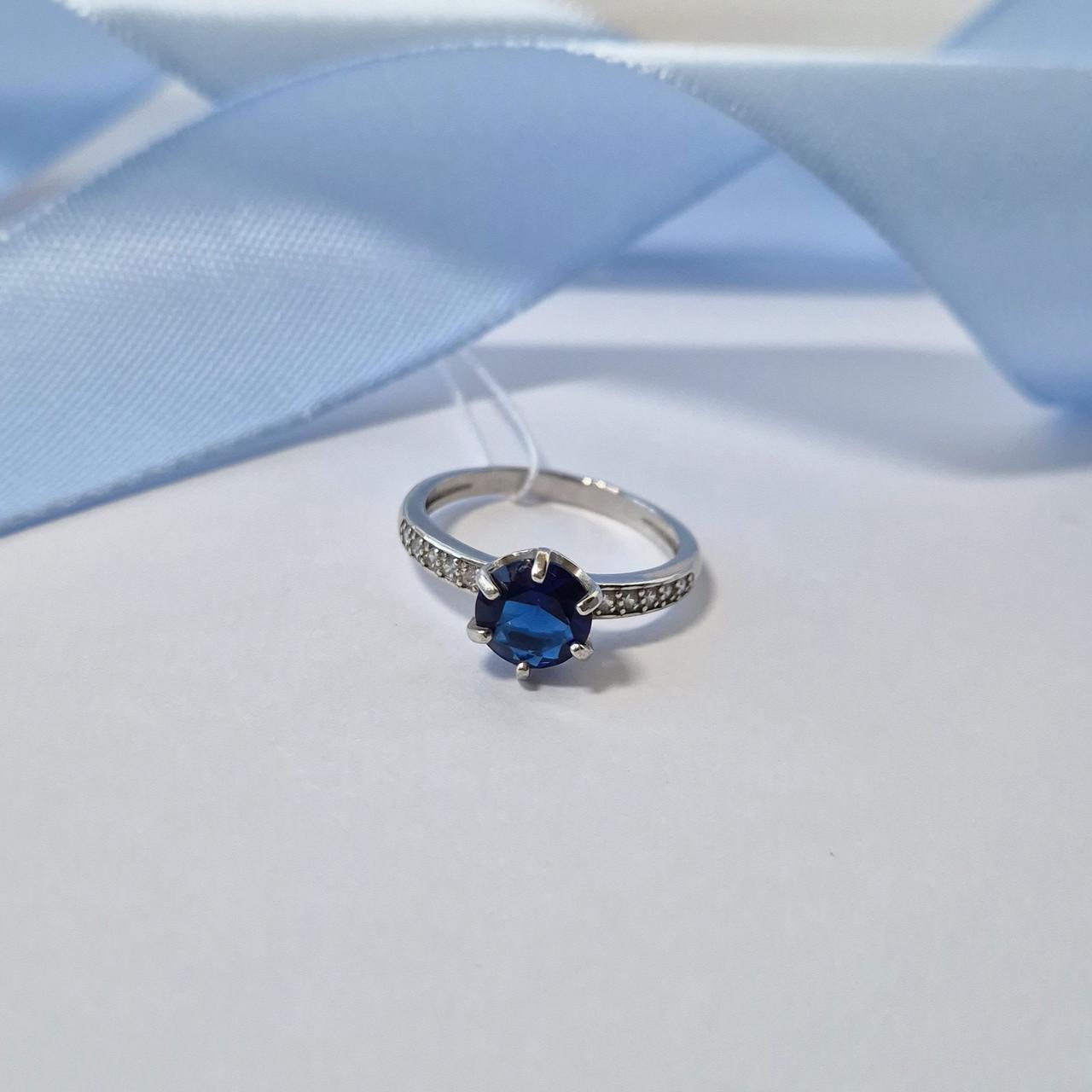 Кольцо с синим камнем р. 17 925 пробы 1,98 г (81049с)