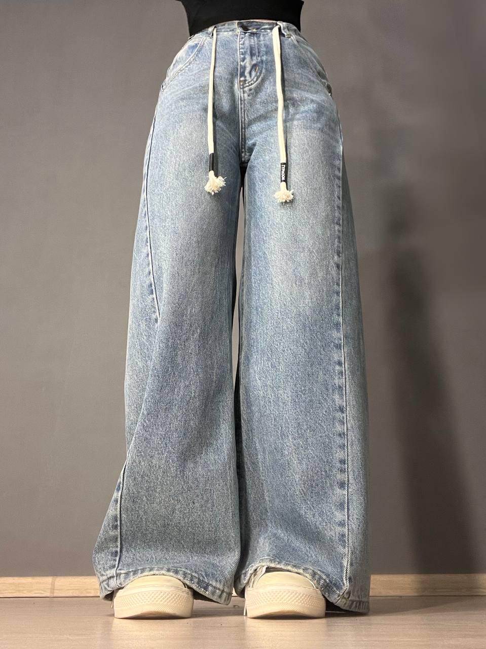 Джинси жіночі Simeile 89616 палаццо широкі зкошений шов попереду висока талія зі шнурком L Блакитний (3539) - фото 8 Джинси жіночі Simeile 89616 палаццо широкі зкошений шов попереду висока талія зі шнурком L Блакитний (3539) - фото 8