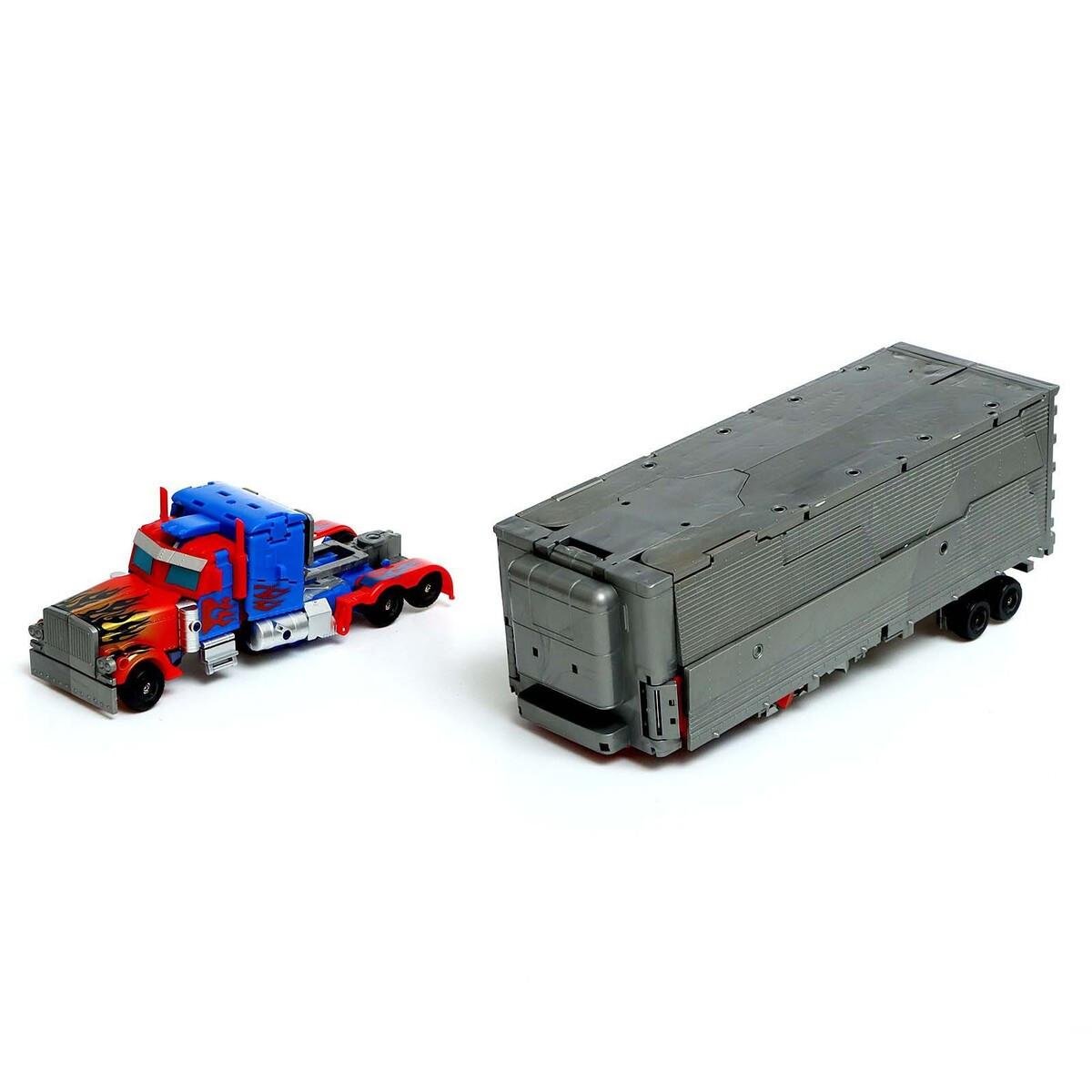 Іграшковий Робот-Трансформер Оптимус Прайм з причепом (28443890) - фото 8