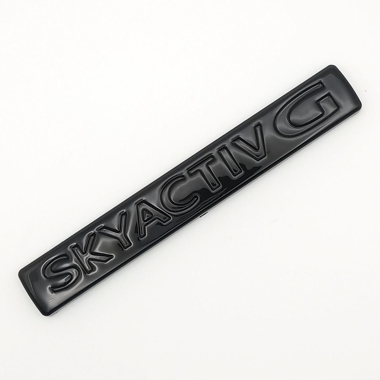 Эмблема надпись Skyactiv G Mazda ABS 10,5х1,5 см Черный глянцевый (2690633221)