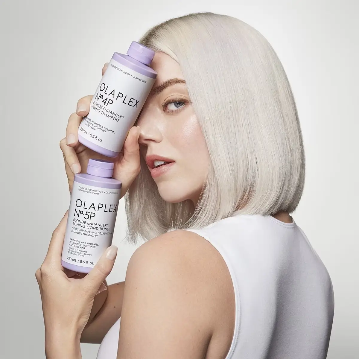 Шампунь тонирующий Olaplex №4P Магия блонду Blonde Enhancer Toning Shampoo с фиолетовым пигментом 250 мл - фото 8