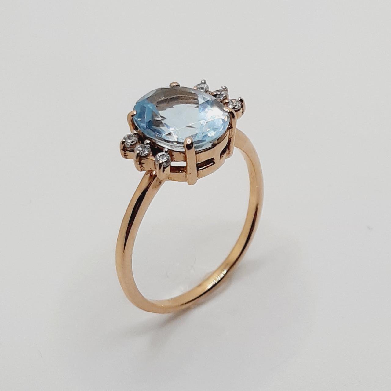 Кольцо золото голубой топаз овал 585° 2,96 г р. 18 (КБ339)