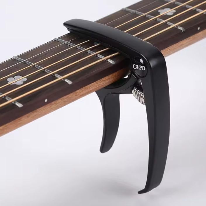 Каподастр CAPO для гитары с медатором.