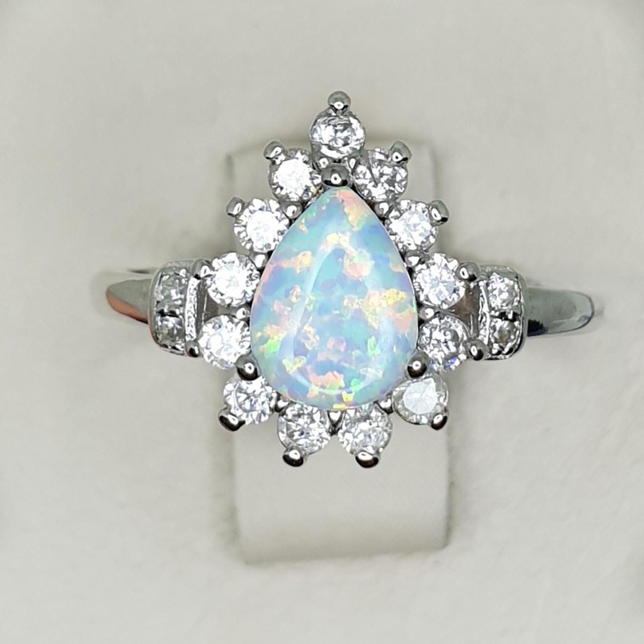 Кольцо серебряное с опалом р. 18 1,98 г (1413189370)